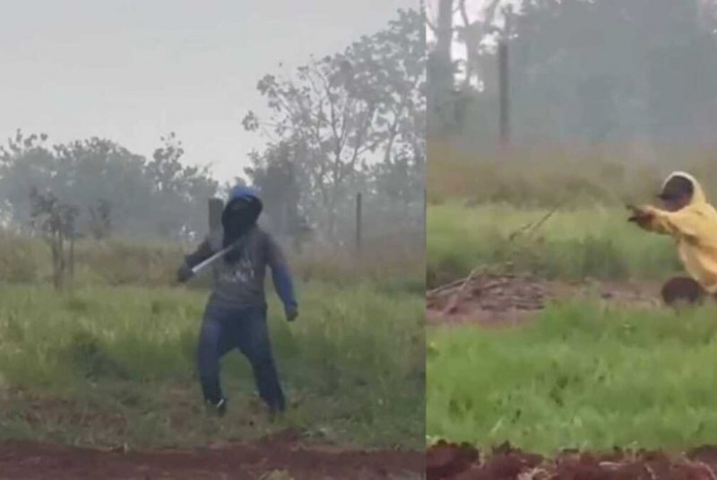 Homem bate no peito com facão enquanto ameaça fazendeiro durante invasão em Dourados (vídeo)